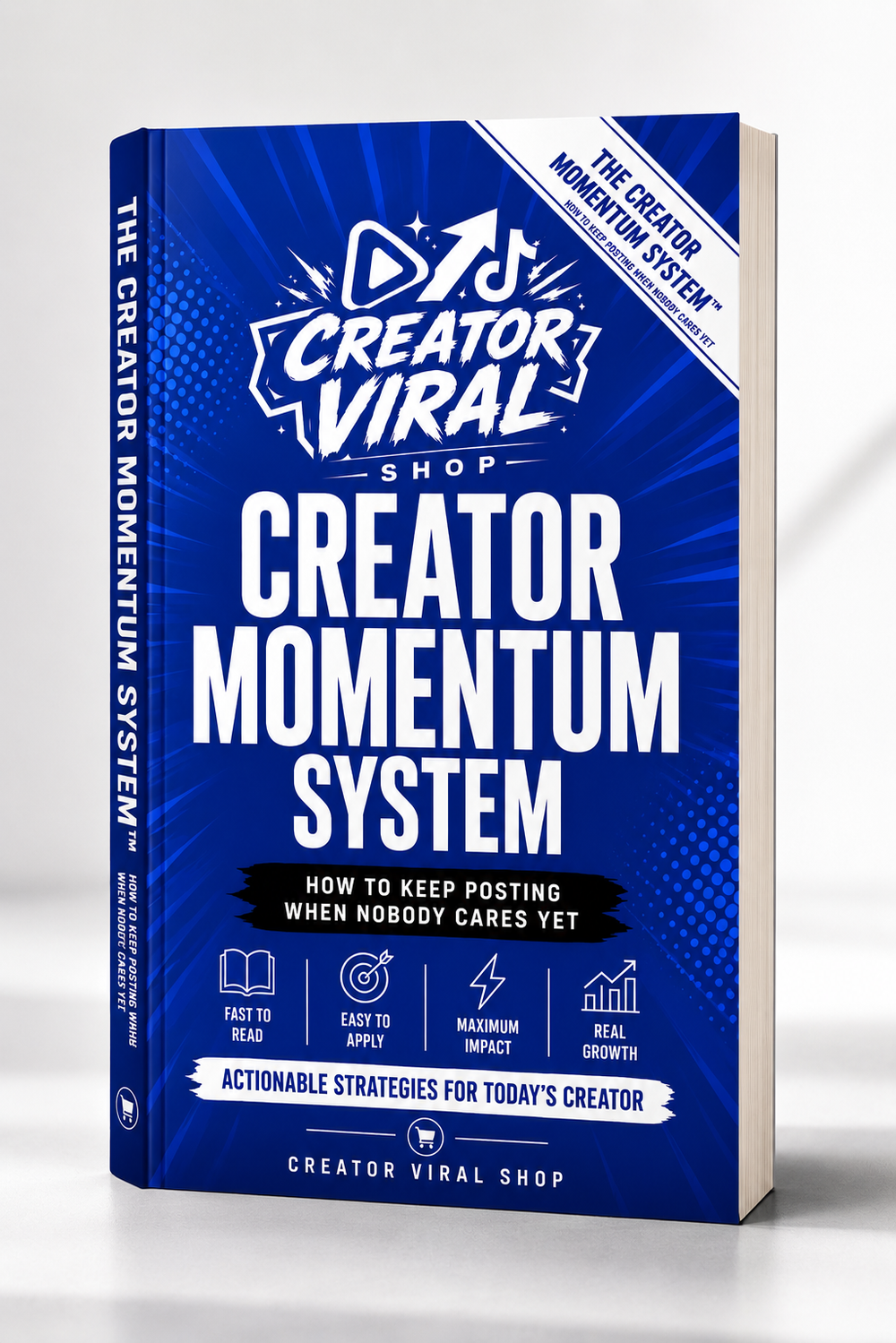 Book titled 'Creator Momentum System' by Creator Viral Shop on a white background